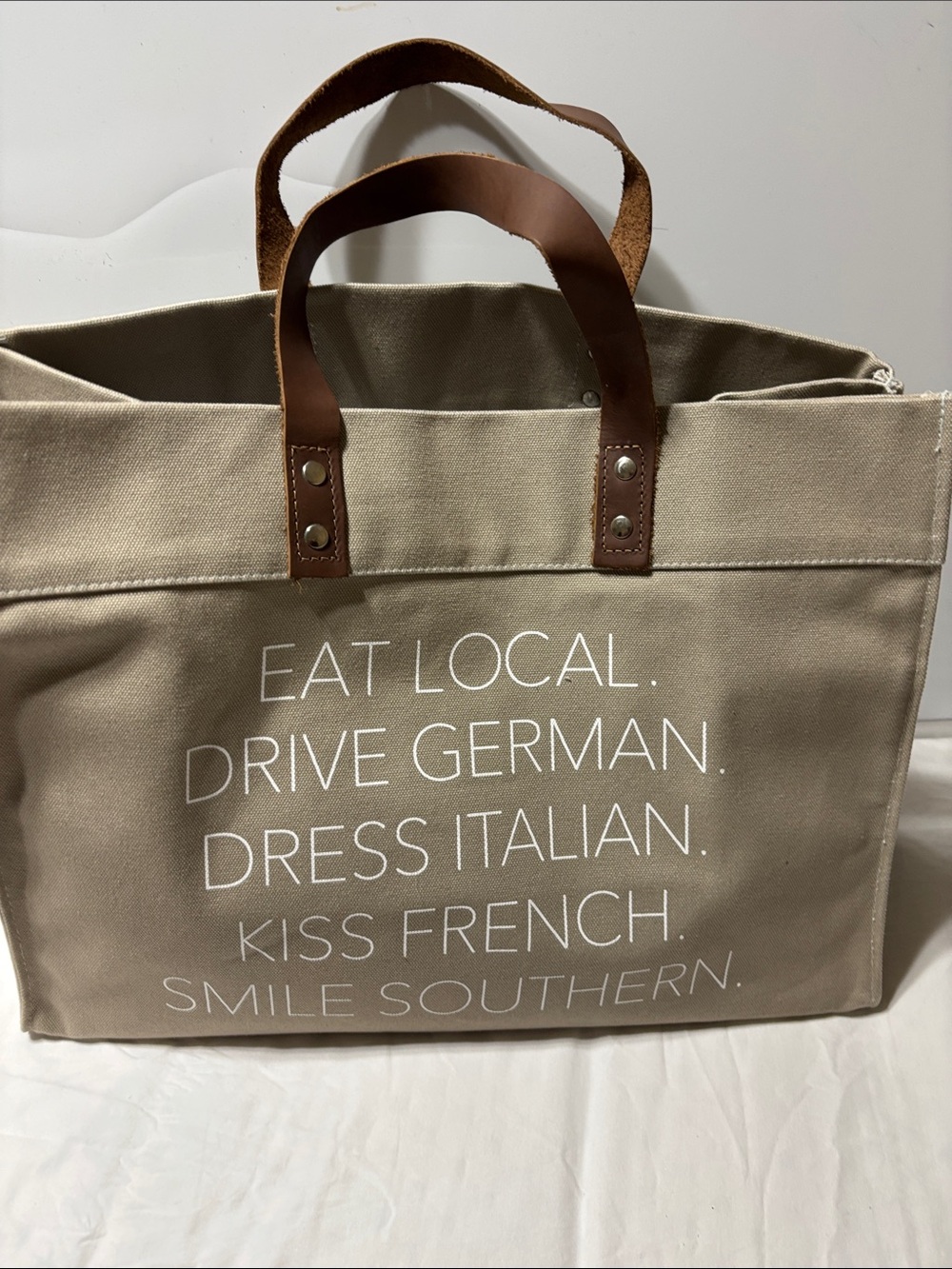 Neutral Taupe Canvas Tote with Leather Handles and Typographic Print.NWOT
